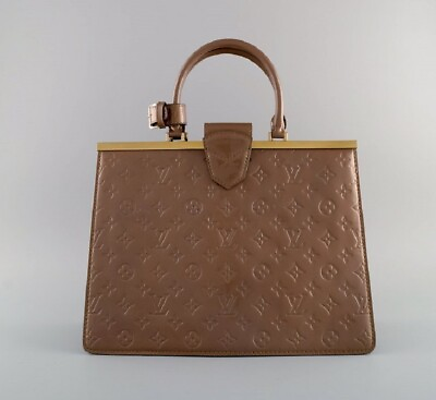 #ad Louis Vuitton. Light chocolate handbag with monograms. Approx. 2000. $2090.00