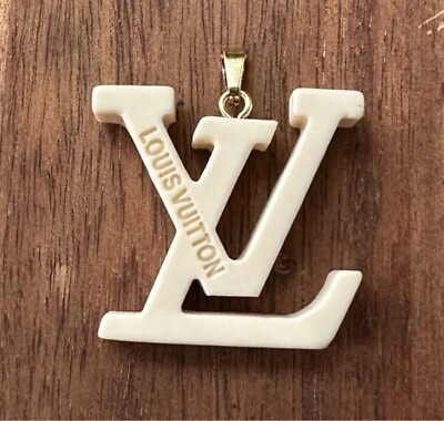 #ad Louis Vuitton White LV Charm ; 30mm $20.00