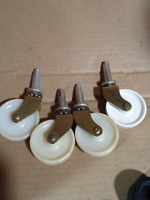 #ad Set of 4 Vintage White Plastic and Brass Caster Wheels 2quot; Wheel 1.75quot; Post VTG $12.50